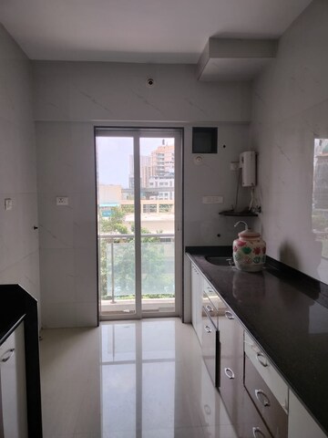 Kitchen in 1 BHK Apartment at Dedhia Elita, Ghodbunder Road – for Rent