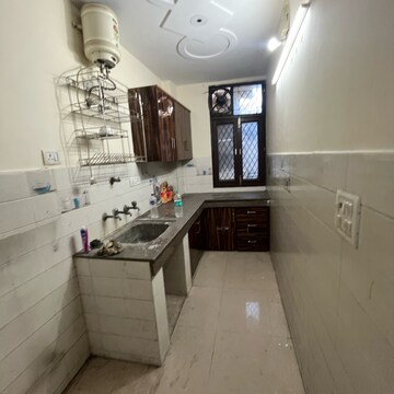 Kitchen in 2 BHK Builder Floor at Khirki Extension – for Rent