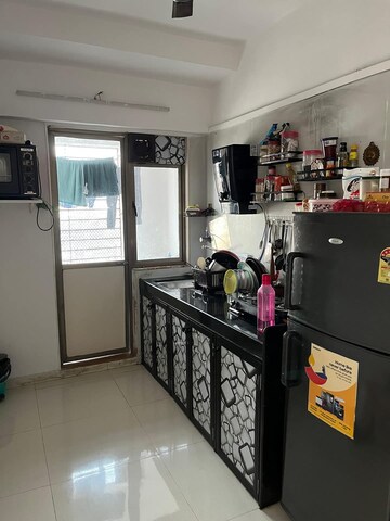 Kitchen in 1 BHK Apartment at Sheth Vasant Sagar Complex, Kandivali East – for Sale