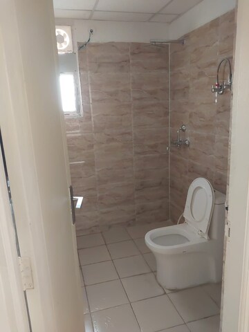 Bathroom in 2.5 BHK Apartment at Ajnara Le Garden, Sector 16b Greater Noida – for Rent