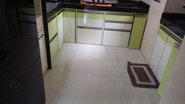 Kitchen in 2 BHK Apartment at Naupada – for Sale