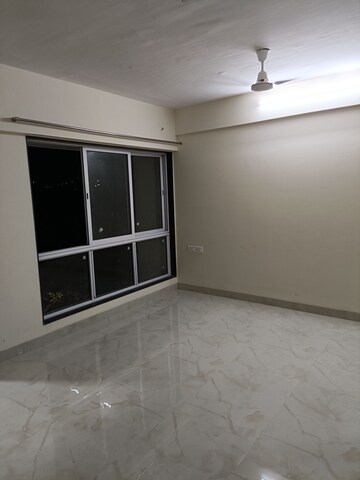 Room in 2 BHK Apartment at Omkar Signet, Malad East – for Rent