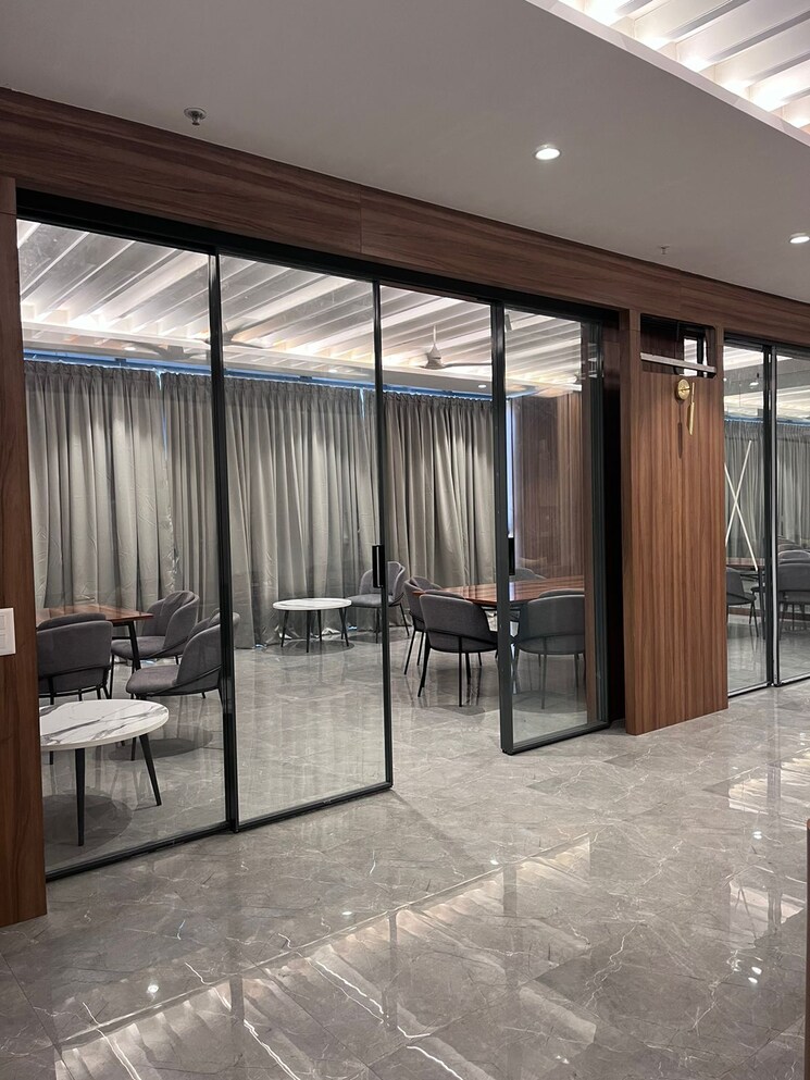 Living Room, amanora-gold-towers 2 Bedroom 710 Sq.Ft. Apartment In Hadapsar Pune 7940519