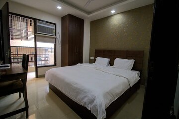 Bedroom in 1 BHK Apartment at Sheth Vasant Sagar Complex, Kandivali East – for Sale