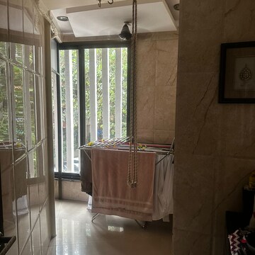 Living Room in 2.5 BHK Apartment at Rajkamal Heights, Mint Colony – for Rent