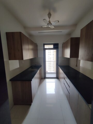 Kitchen in 2.5 BHK Apartment at Lodha Splendora, Ghodbunder Road – for Rent