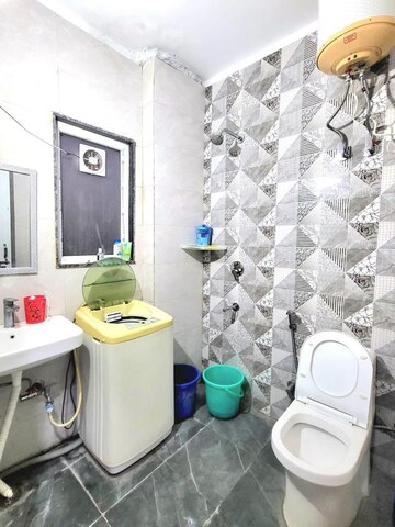 Master Bedroom in 1 RK Builder Floor at Ansal Sushant Lok I, Sector 43 – for Rent