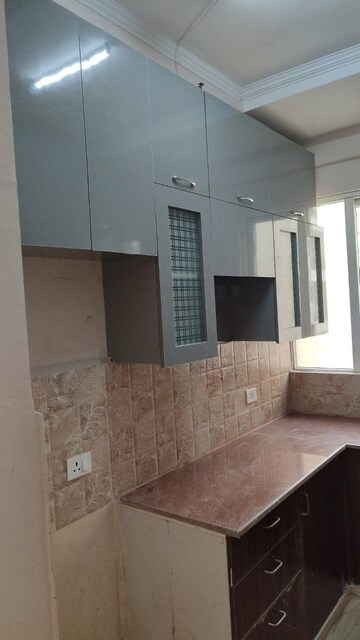 Kitchen in 2 BHK Apartment at Amrapali Leisure Park, Amrapali Leisure Valley – for Sale