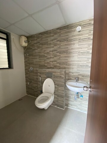 Bathroom in 1.5 BHK Apartment at Lodha Lakeshore Greens, Dombivli East – for Rent