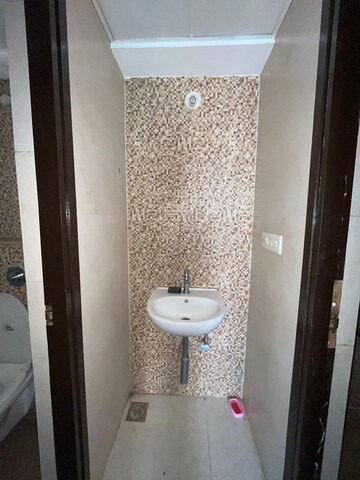 Bathroom in 1 BHK Apartment at Lodha Palava City Lakeshore Greens, Dombivli East – for Rent
