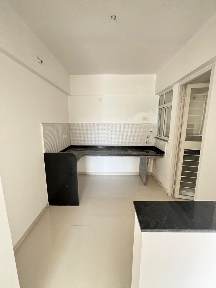 Kitchen, krisala-41-elite 2 Bedroom 718 Sq.Ft. Apartment In Tathawade Pune 7941527