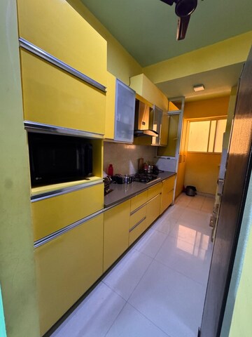 Kitchen in 2 BHK Apartment at Amrapali Golf Homes, Sector 4, Greater Noida – for Sale