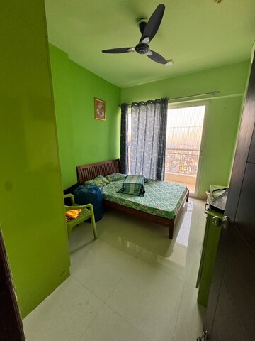 Living Room in 2 BHK Apartment at Amrapali Golf Homes, Sector 4, Greater Noida – for Sale
