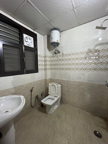 Bathroom in 1 BHK Builder Floor at Ansal Sushant Lok I, Sector 43 – for Rent