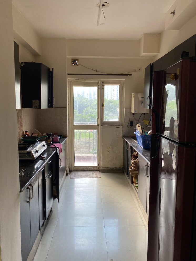 Kitchen, gardenia-golf-city 3 Bedroom 1350 Sq.Ft. Apartment In Sector 75 Noida 7941762