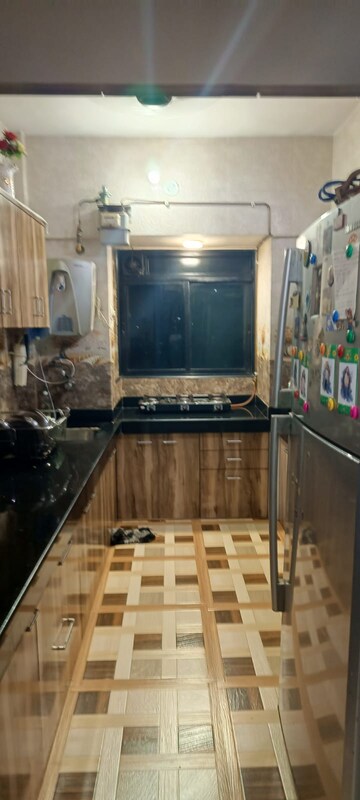 Kitchen in 2 BHK Apartment at Cirrus CHSL Cosmos Paradise, Vasant Vihar – for Sale