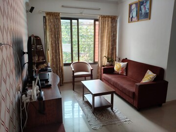 Living Room in 1.5 BHK Apartment at Tharwani Vedant Millenia, Titwala – for Sale