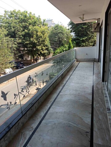 Balcony in 3.5 BHK Apartment at Ansal Sushant Lok I, Sector 43 – for Rent