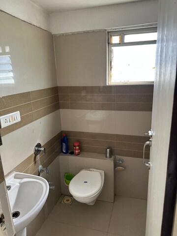 Bathroom in 3 BHK Apartment at Vesu – for Sale