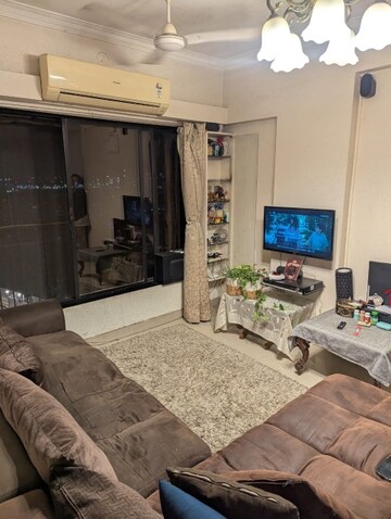 Living Room in 1 BHK Apartment at Fairmont La Paradiso, Santacruz East – for Rent
