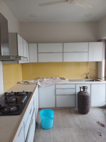 Kitchen in 5 BHK Apartment at DLH Sorrento, Veera Desai Road – for Sale
