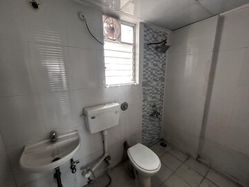 Bathroom in 2 BHK Apartment at Shapoorji Pallonji Joyville Celestia, Hadapsar – for Rent