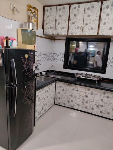 Kitchen in 2 BHK Apartment at MICL Aaradhya Prime Park, Mira Road – for Rent