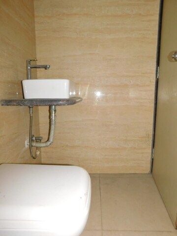 Bathroom in 2 BHK Apartment at Suryakiran CHS, Andheri West – for Sale