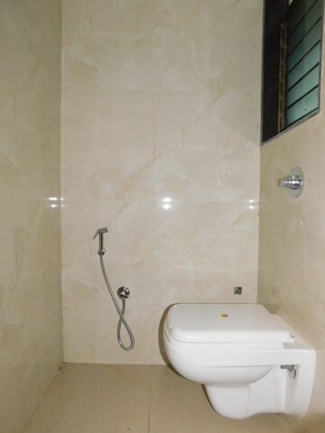 Bathroom in 2 BHK Apartment at Suryakiran CHS, Andheri West – for Sale