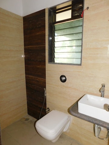 Bathroom in 2 BHK Apartment at Suryakiran CHS, Andheri West – for Sale