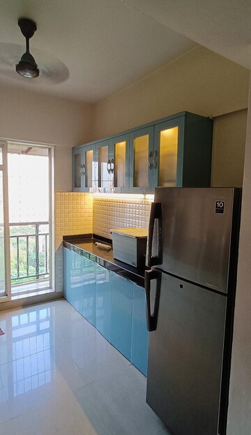 Kitchen in 2.5 BHK Apartment at Rosa Gardenia, Ghodbunder Road – for Sale