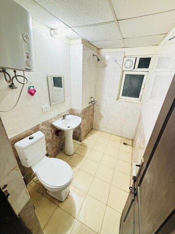 Bathroom in 2 BHK Apartment at Amrapali Silicon City, Sector 76 – for Sale