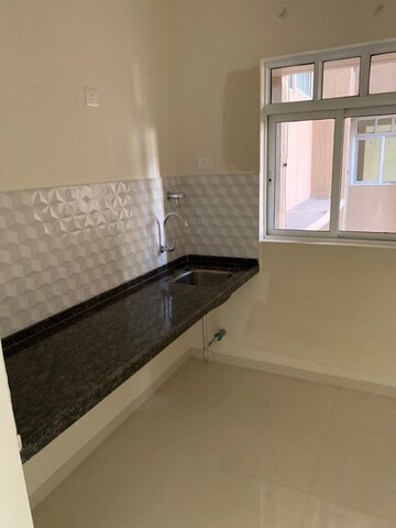 Kitchen in 1 BHK Apartment at Godrej Green Cove, Mahalunge – for Rent