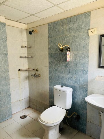 Bathroom in 2 BHK Apartment at Amrapali Silicon City, Sector 76 – for Sale
