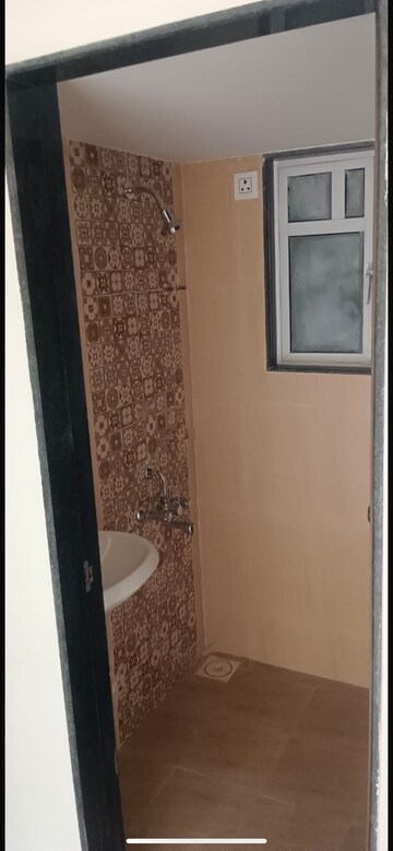 Bathroom in 1 BHK Apartment at JP North Aviva, Mira Road – for Rent