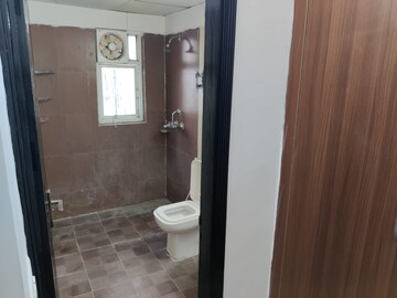 Bathroom in 2 BHK Apartment at Amrapali Silicon City, Sector 76 – for Sale