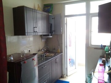 Kitchen in 2 BHK Apartment at Amrapali Silicon City, Sector 76 – for Sale