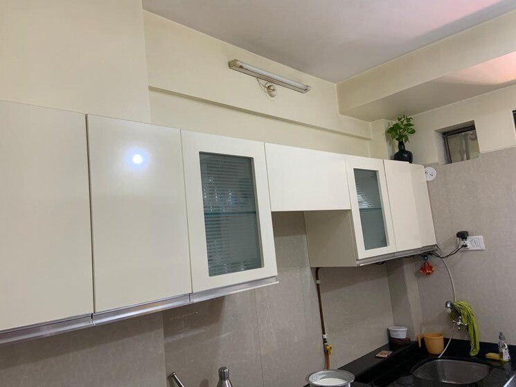 Kitchen, unique-the-skyline 3 Bedroom 1450 Sq.Ft. Apartment In Mira Road Thane 7944128