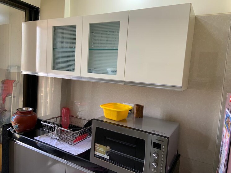 Kitchen, unique-the-skyline 3 Bedroom 1450 Sq.Ft. Apartment In Mira Road Thane 7944128