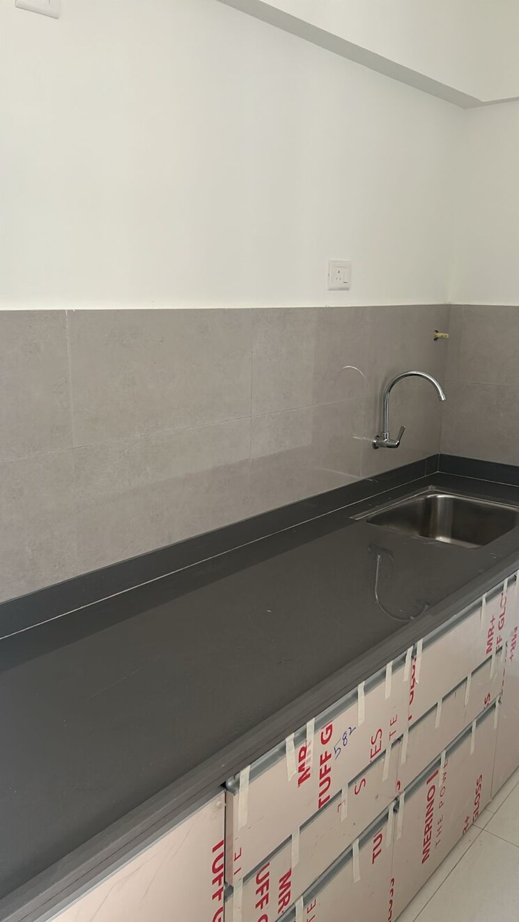 Kitchen, divine-palm-springs 2 Bedroom 682 Sq.Ft. Apartment In Wakad Pune 7944131