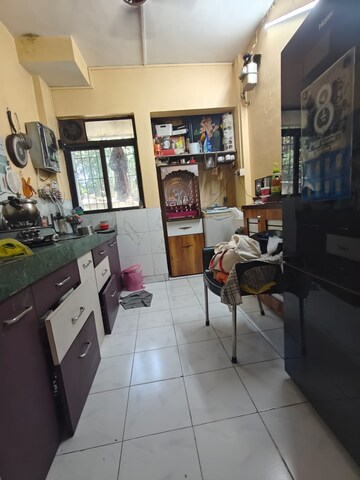 Master Bedroom in 1 BHK Apartment at Swastik Park CHS, Ghodbunder Road – for Sale