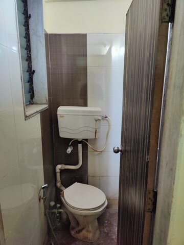 Bathroom in 1 BHK Apartment at Kavya Hill View CHS, Anand Nagar – for Rent
