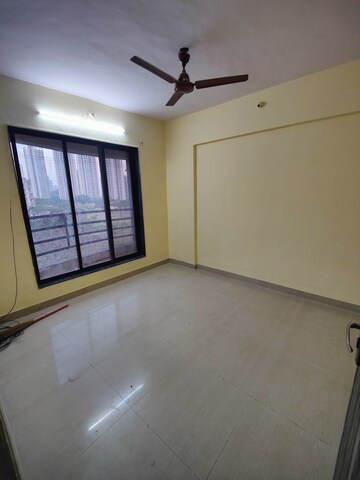 Master Bedroom in 1 BHK Apartment at Kavya Hill View CHS, Anand Nagar – for Rent