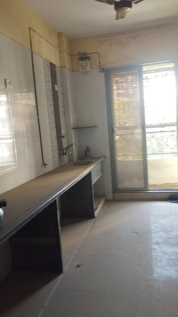 Kitchen in 3 BHK Apartment at Regency Estate, Dombivli East – for Rent