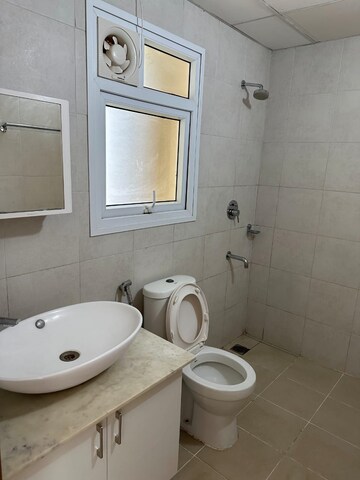 Bathroom in 2 BHK Apartment at Bhartiya Nikoo Homes, Thanisandra Main Road – for Sale