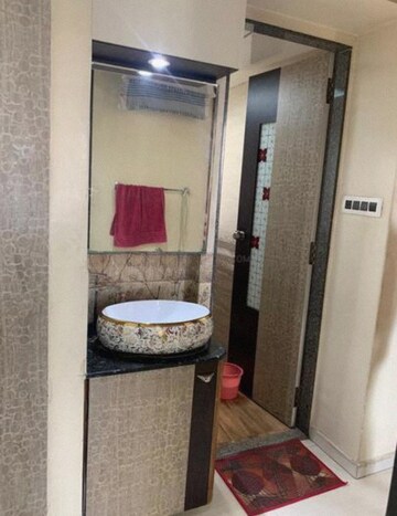 Bathroom in 2 BHK Apartment at Larkins Pride Palms, Kolshet Road – for Rent