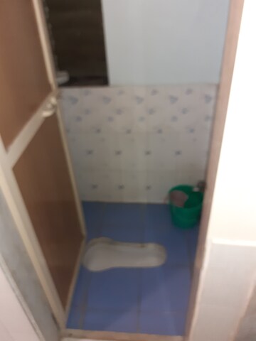 Bathroom in 1 BHK Apartment at Amritvan Complex, Aarey Colony – for Rent