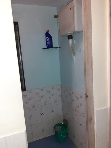 Bathroom in 1 BHK Apartment at Amritvan Complex, Aarey Colony – for Rent