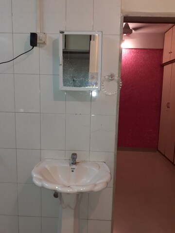 Bathroom in 1 BHK Apartment at Amritvan Complex, Aarey Colony – for Rent