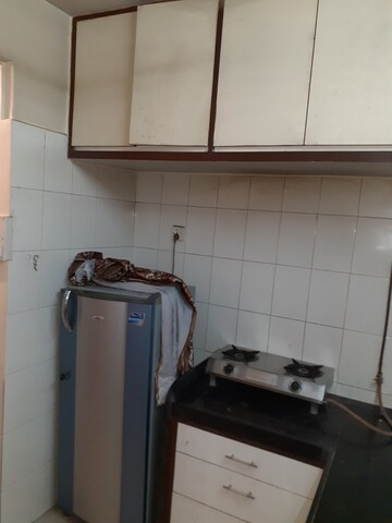 Kitchen in 1 BHK Apartment at Amritvan Complex, Aarey Colony – for Rent